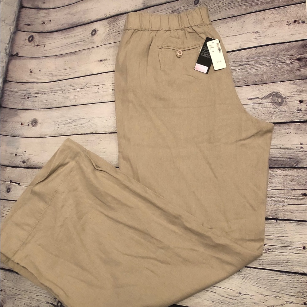 Beige linen pants.